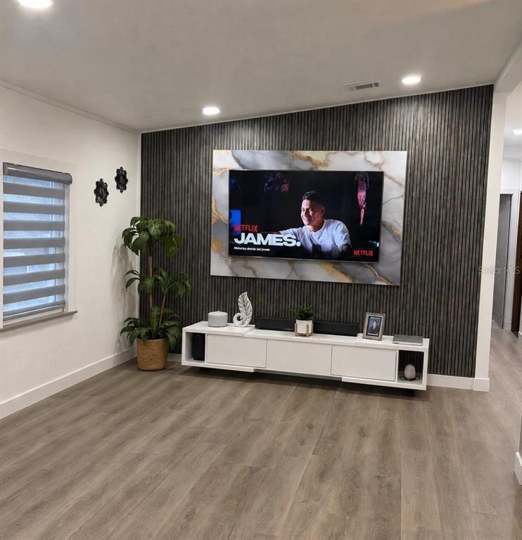 4 Eden Cemetery Road Frostproof, FL 33843 - Photo 5 of 15 a living room with furniture and a flat screen tv