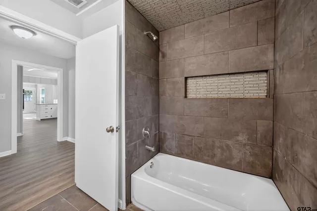 a bathroom with a bathtub