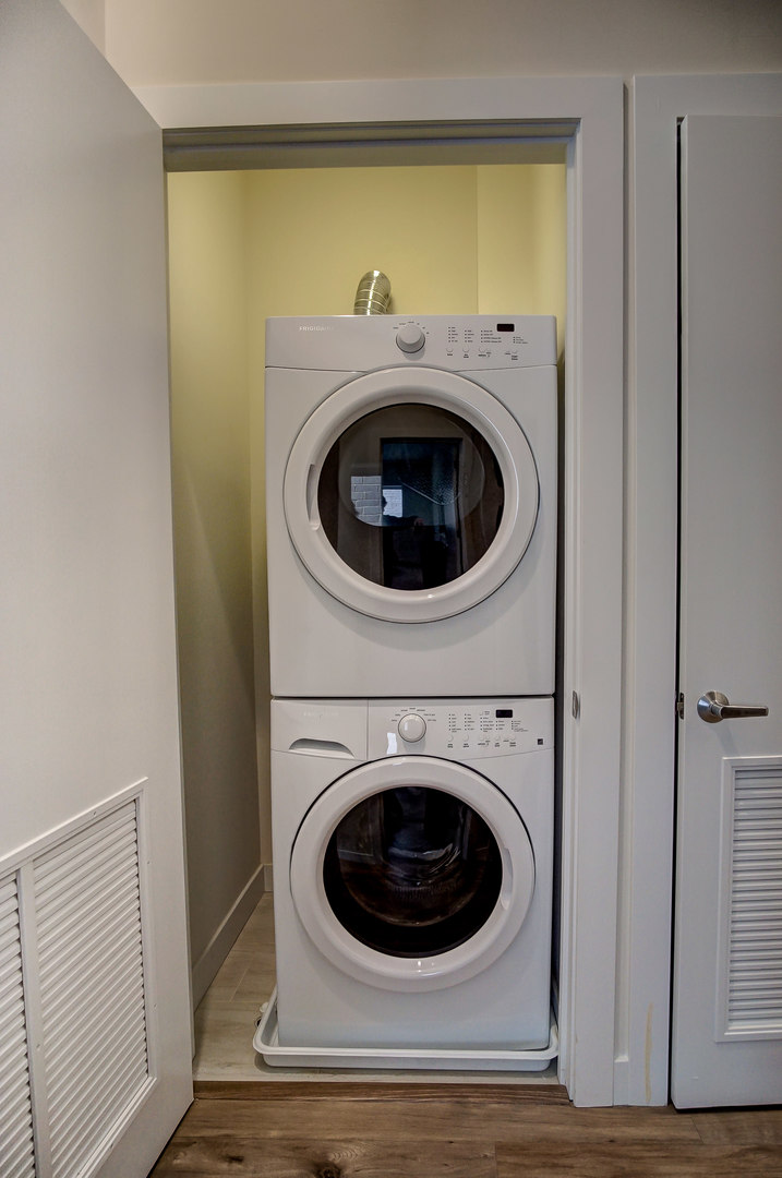 2532 West Addison Street, Unit 3E Chicago, IL 60618 - Photo 19 of 20 a utility room with dryer and washer