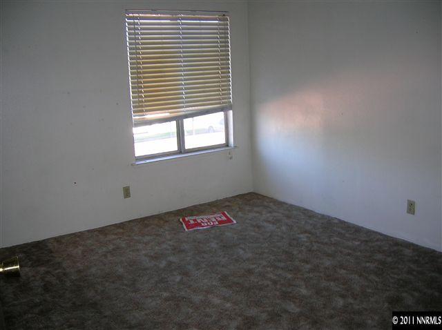 4602 Neil Road, Unit 90 Reno, NV 89502 - Photo 8 of 10 an empty room with a window
