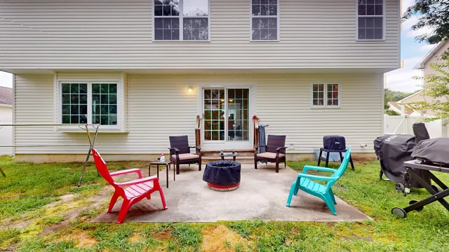 a backyard of a house with lots of green space