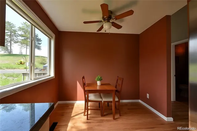 a workspace with furniture and window