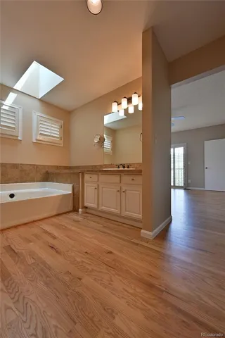 a view of a livingroom with wooden floor