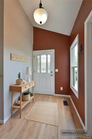 a workspace with furniture and window