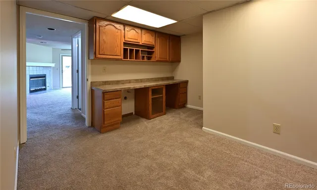 a view of a kitchen with a sink