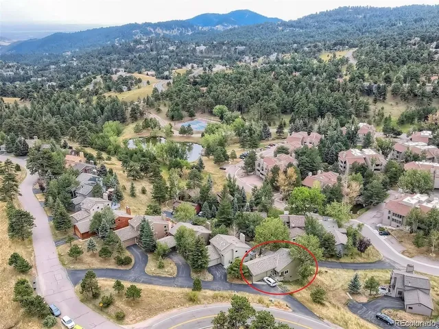 an aerial view of a house with a outdoor space