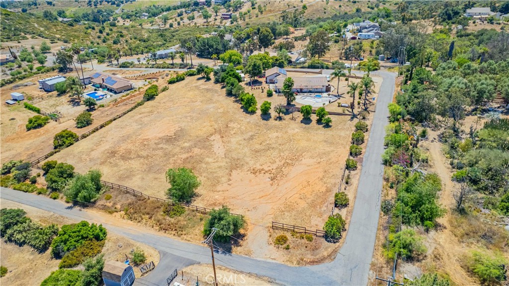 15529 Sierra Grande Road Valley Center, CA 92082 - Photo 1 of 1 an aerial view of residential houses with outdoor space