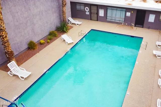 a backyard of a house with seating space