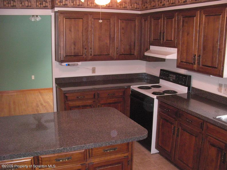 1195 Chase Road Shavertown, PA 18708 - Photo 4 of 10 a kitchen with a sink and cabinets