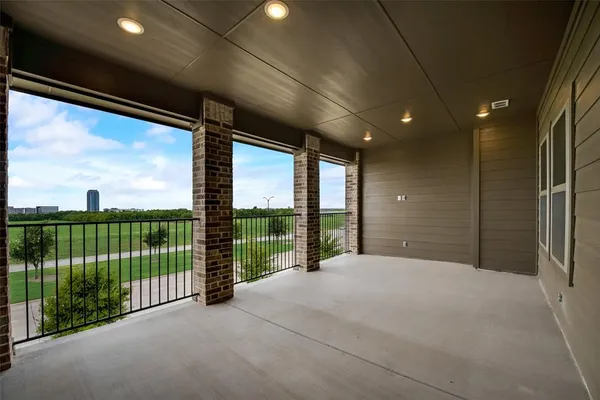 a view of a living room and balcony