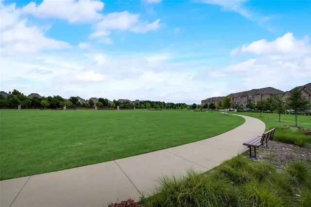 a view of a garden and basketball court