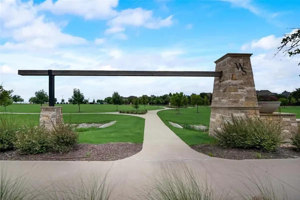 a view of a swimming pool with lounge chair