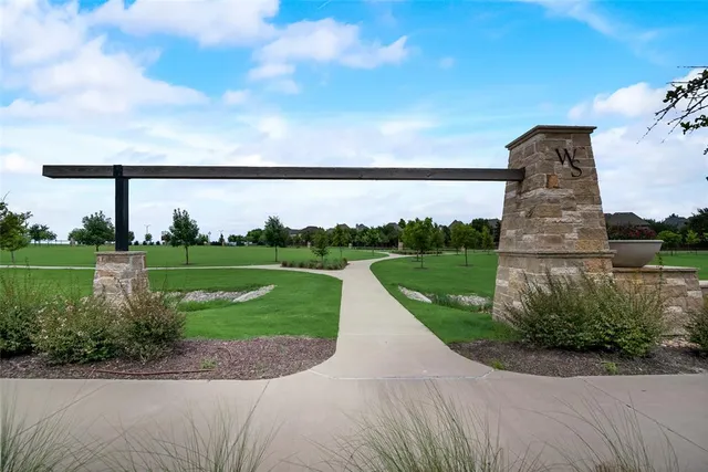 a view of a swimming pool with lounge chair