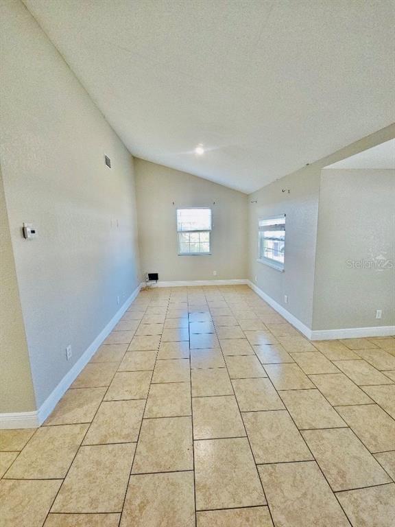 1310 West Burger Street Tampa, FL 33604 - Photo 5 of 14 a view of an empty room and window