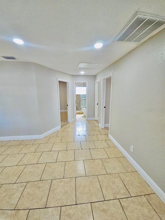 1310 West Burger Street Tampa, FL 33604 - Photo 6 of 14 a view of an empty room and a window