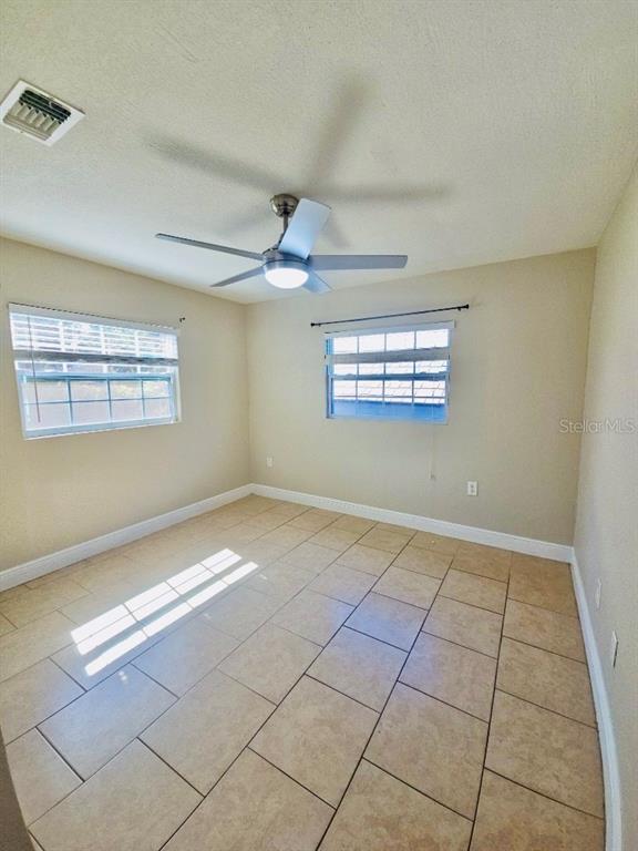 1310 West Burger Street Tampa, FL 33604 - Photo 9 of 14 a view of an empty room and window
