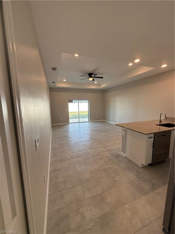 832 Holmes Avenue Lehigh Acres, FL 33974 - Photo 19 of 25 a view of a hallway