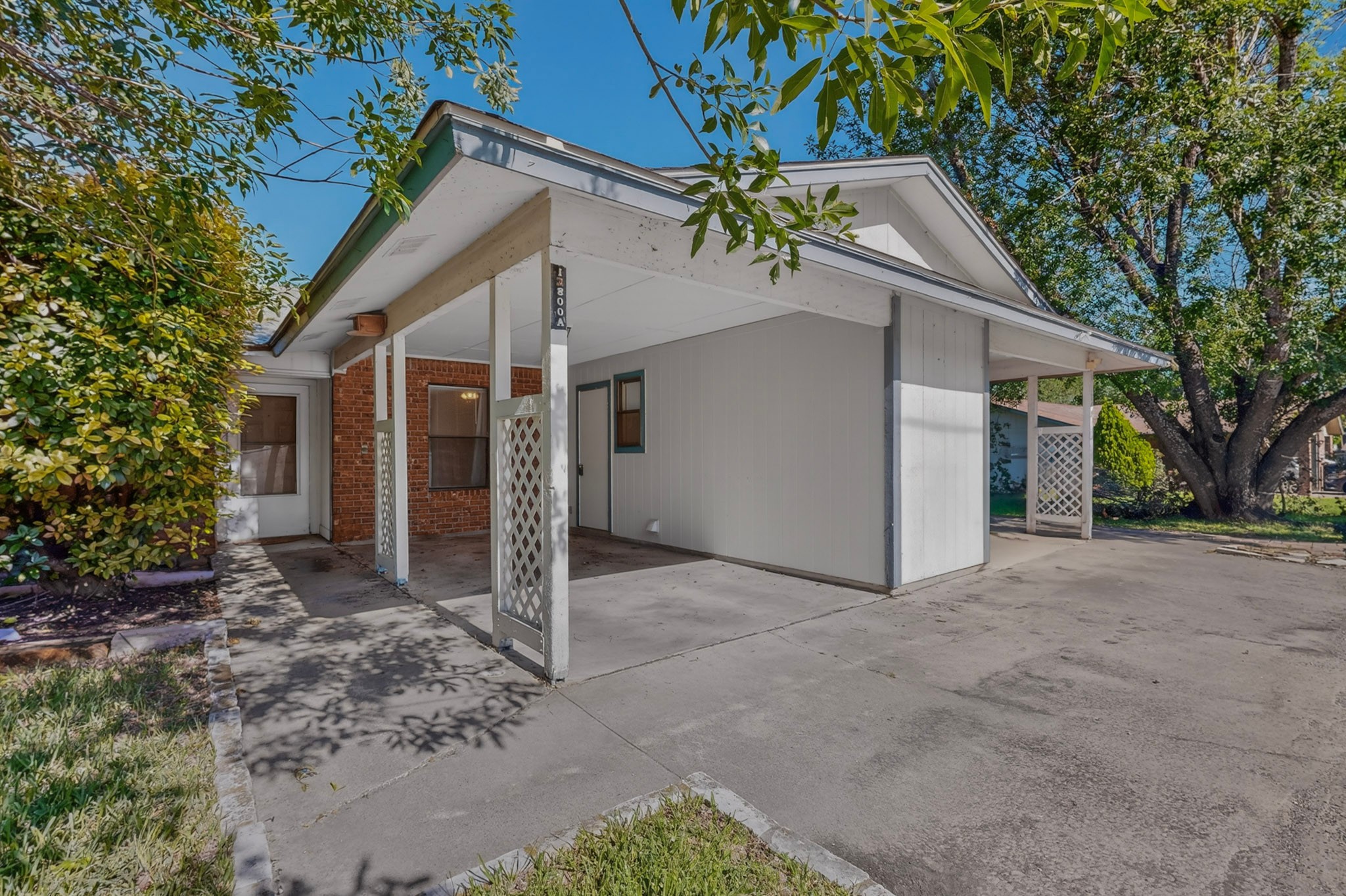 12800 Old San Antonio Road, Unit A Manchaca, TX 78652 - Photo 3 of 28 Carport /utility closet