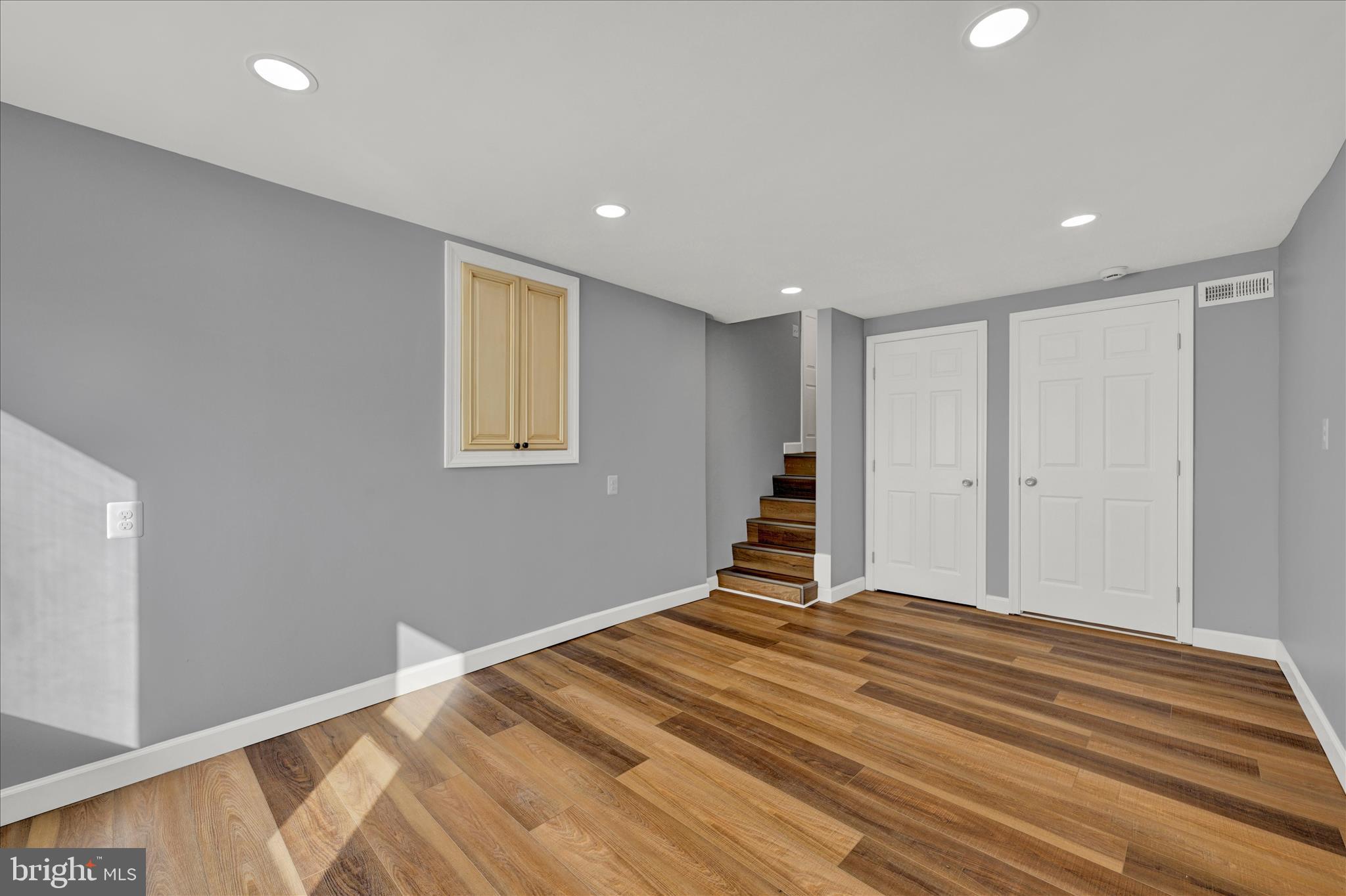 2 Armor Court Baltimore, MD 21220 - Photo 24 of 33 a view of an empty room with wooden floor