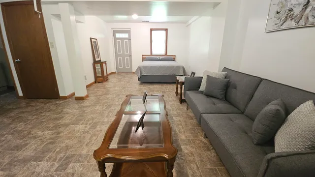 a view of balcony with furniture