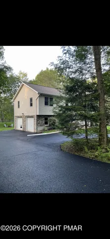 a view of a swimming pool with an outdoor space