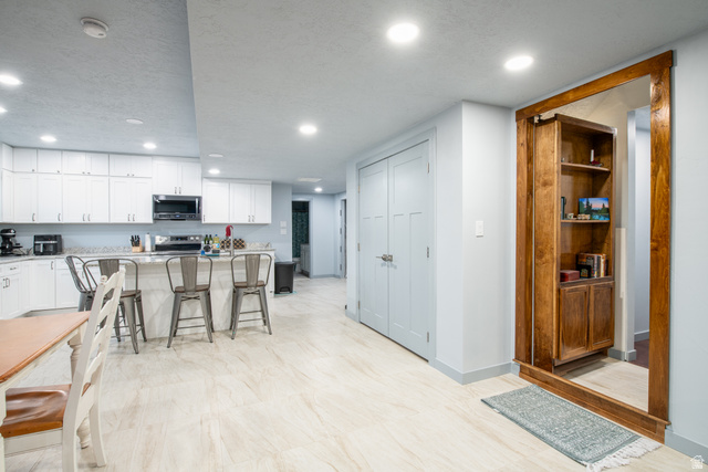262 North Santa Fe Drive Mapleton, UT 84664 - Photo 24 of 46 Recessed lighting illuminates wood-finish flooring