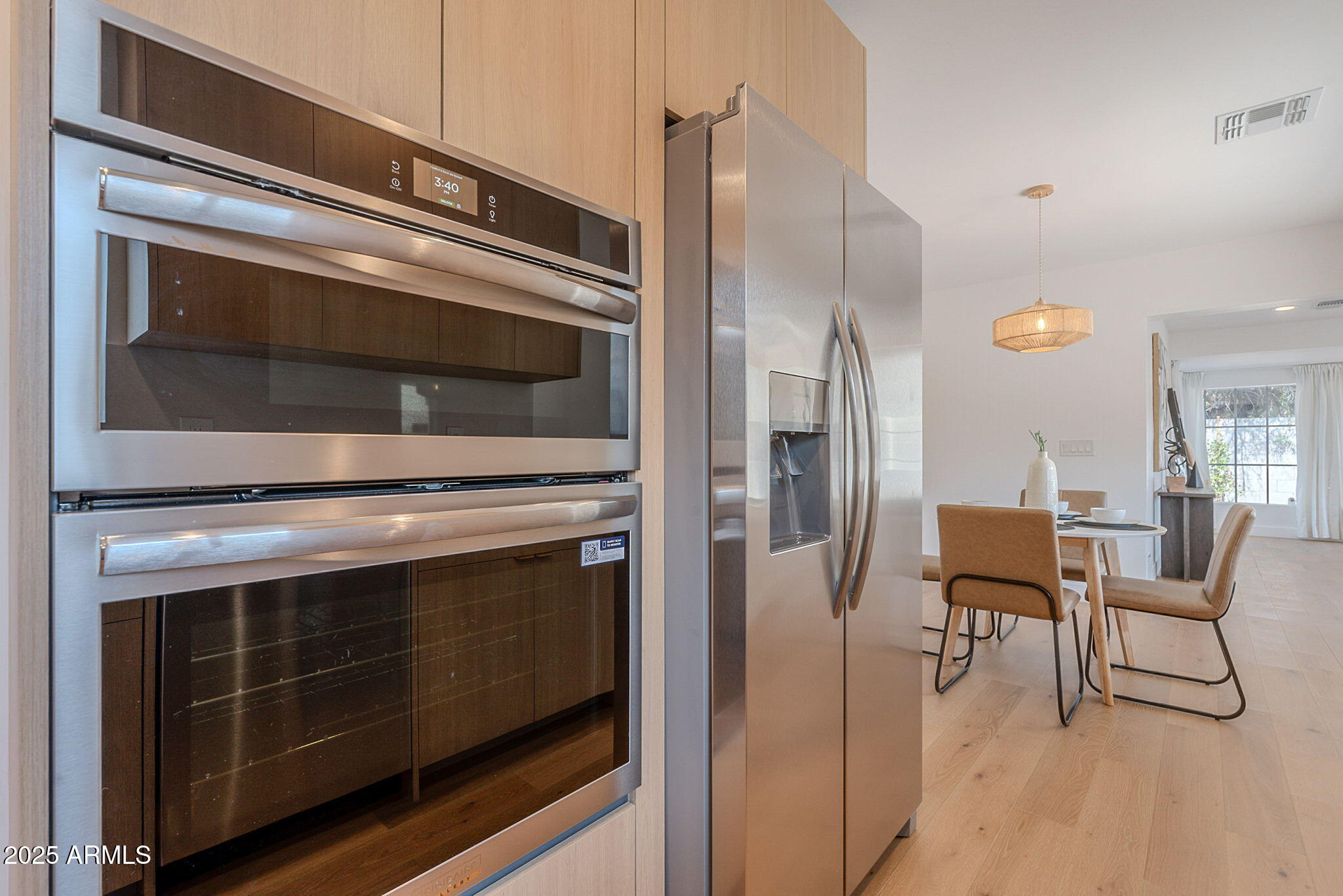 502 East Osborn Road Phoenix, AZ 85012 - Photo 17 of 24 a kitchen with stainless steel appliances a stove and a microwave