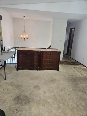 a room that has a bed and a table