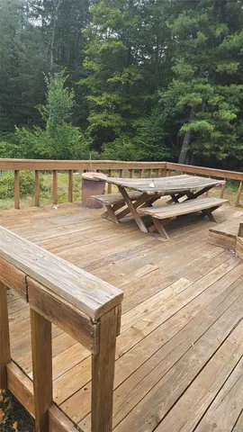a view of swimming pool with seating space