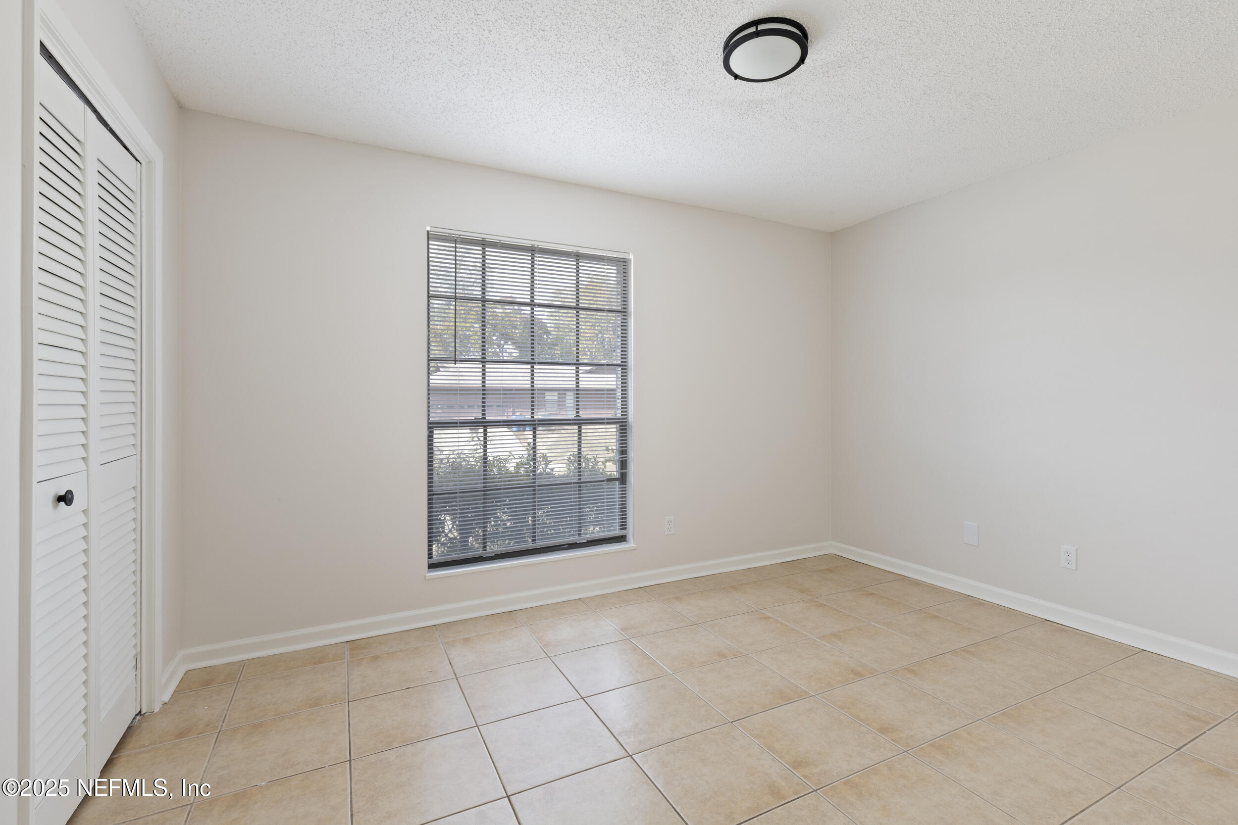 4135 Dawnridge Road East Jacksonville, FL 32277 - Photo 11 of 25 Guest Bedroom 1