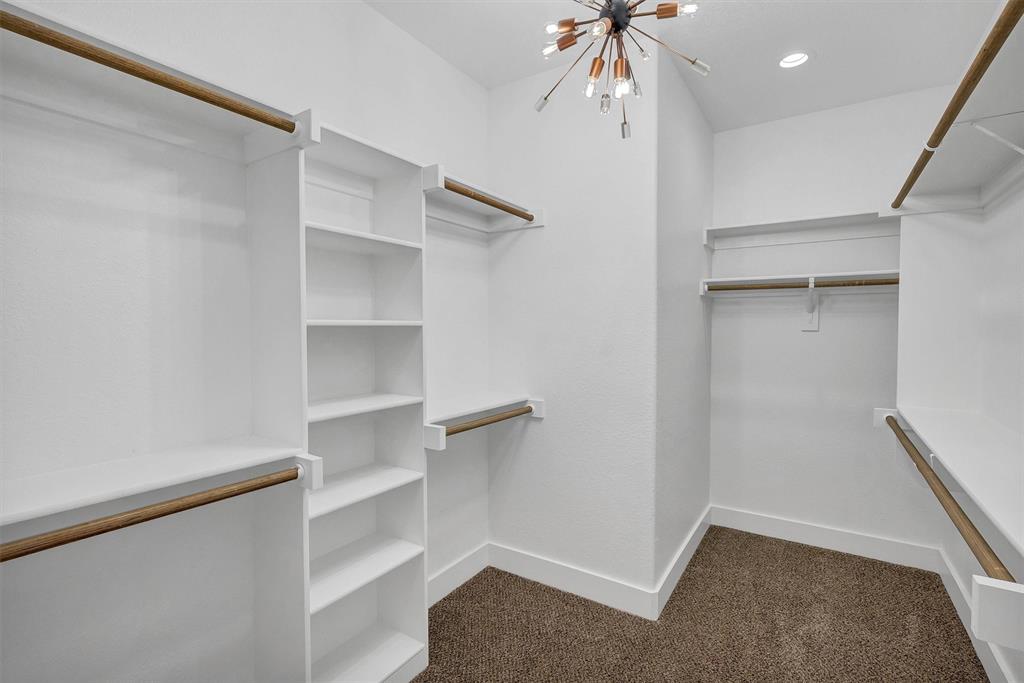 517 Highview Court Godley, TX 76044 - Photo 34 of 39 a view of an empty walk in closet
