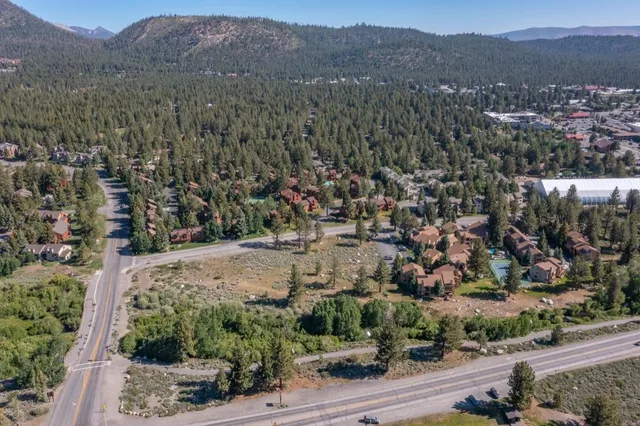 an aerial view of residential house and green space