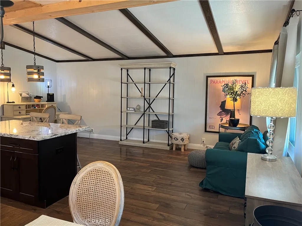 4000 Pierce Street, Unit 284 Riverside, CA 92503 - Photo 20 of 32 a living room with couch and a table