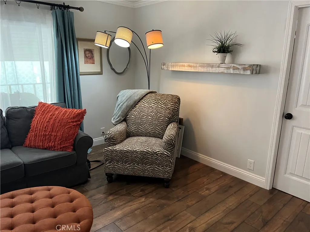 4000 Pierce Street, Unit 284 Riverside, CA 92503 - Photo 6 of 32 a living room with furniture and wooden floor