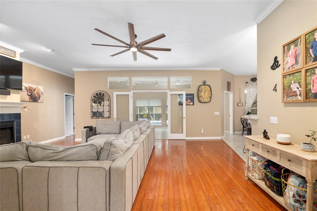 9350 Southwest 46 Place Gainesville, FL 32608 - Photo 11 of 63 a living room with furniture and a fireplace