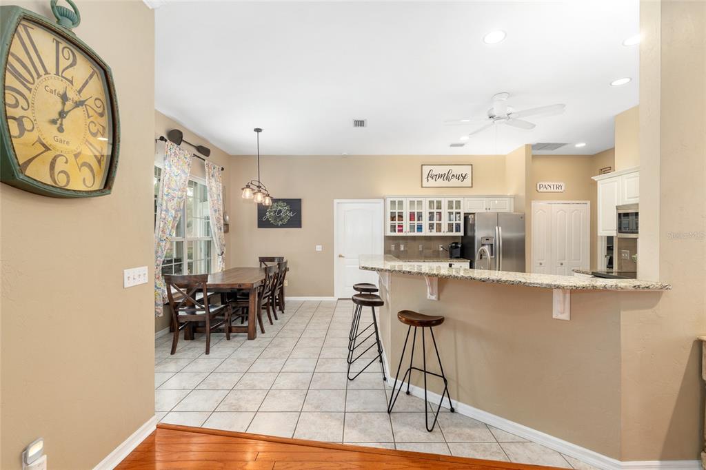 9350 Southwest 46 Place Gainesville, FL 32608 - Photo 18 of 63 a dining room with furniture and window