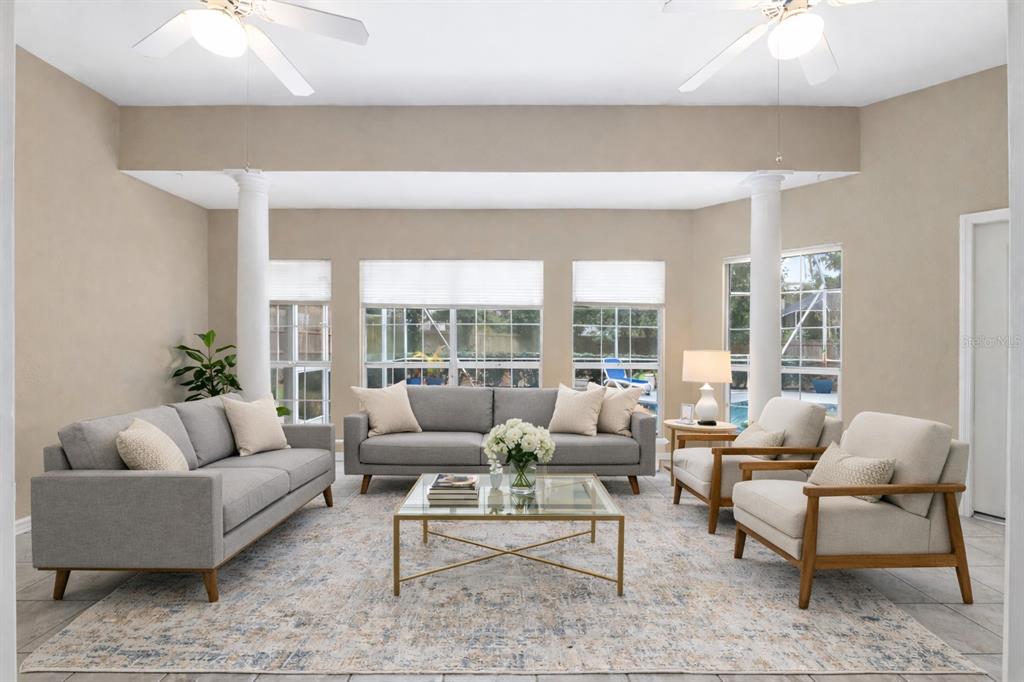 9350 Southwest 46 Place Gainesville, FL 32608 - Photo 51 of 63 a living room with furniture and a large window