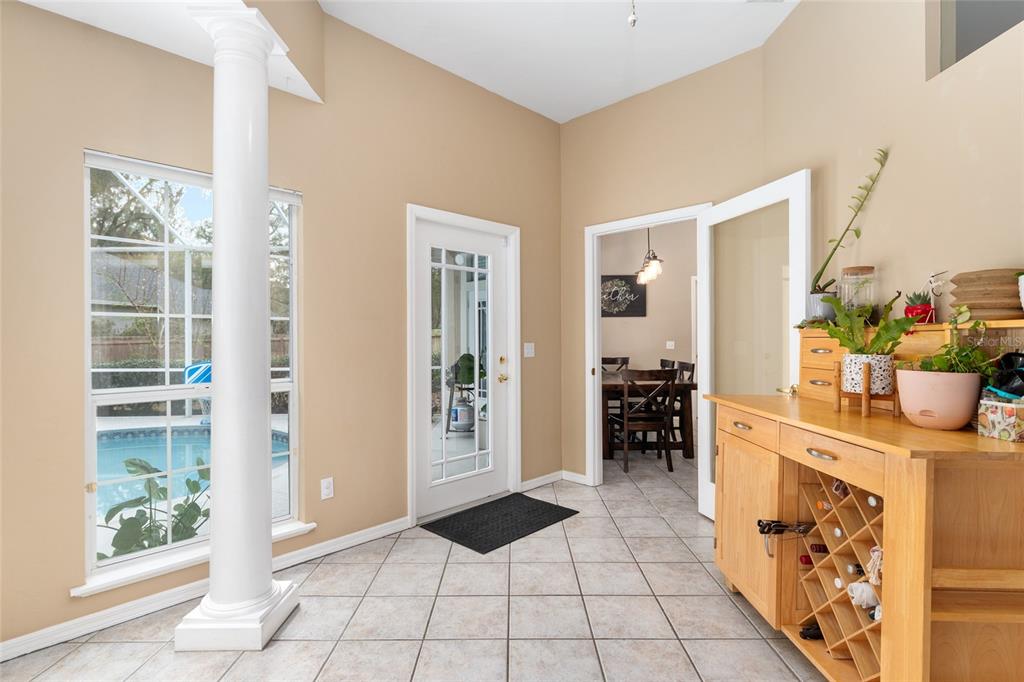 9350 Southwest 46 Place Gainesville, FL 32608 - Photo 53 of 63 a kitchen with stainless steel appliances a stove a sink and a refrigerator