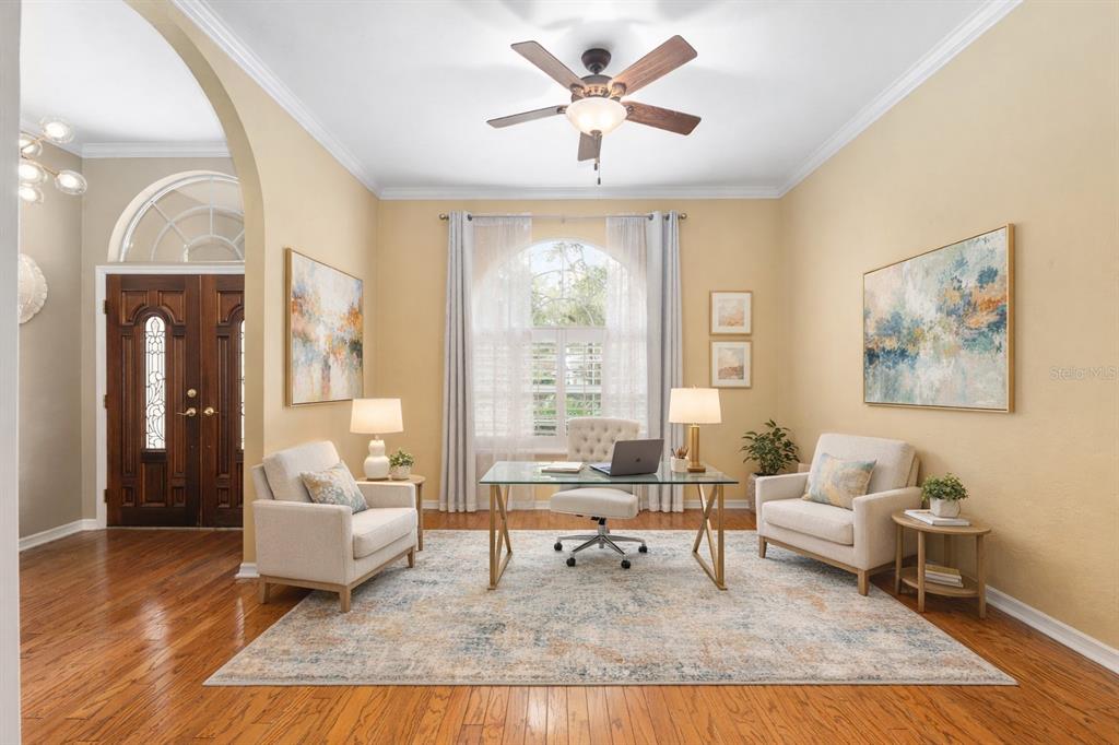 9350 Southwest 46 Place Gainesville, FL 32608 - Photo 7 of 63 a living room with furniture and a large window