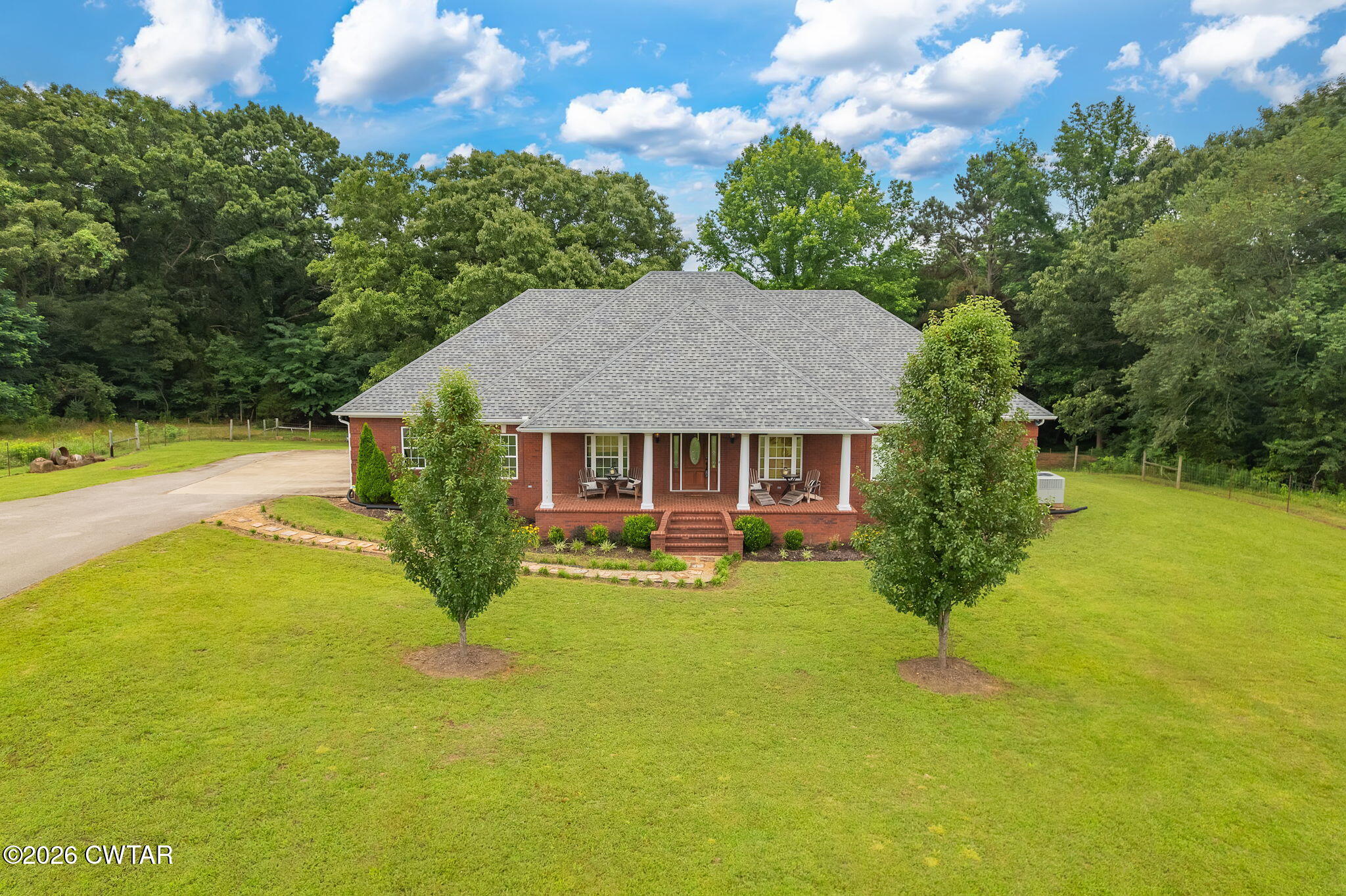 4320 Timberlake-Wildersville Road Lexington, TN 38351 - Photo 57 of 58 a view of a house with pool and a yard