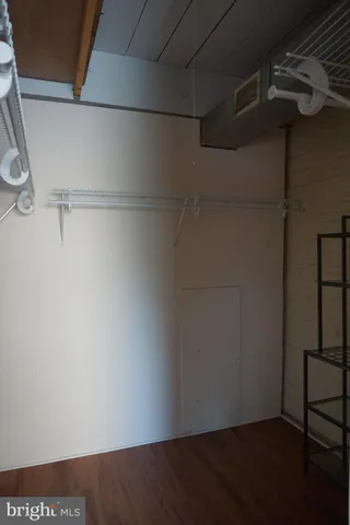 a view of a room with racks on the wall