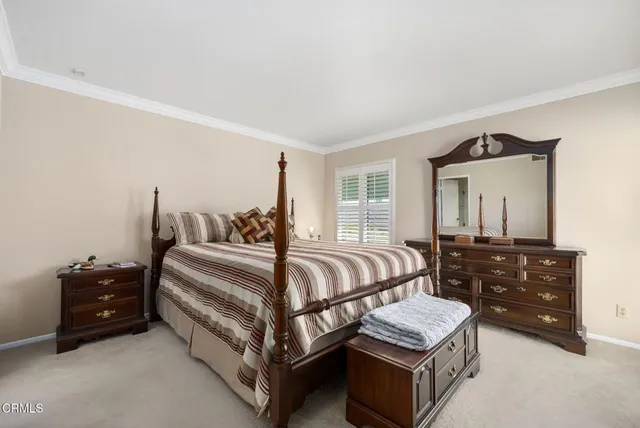 a bathroom with a double vanity sink and mirror