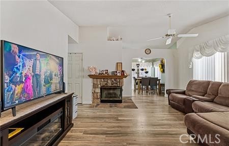 2906 Summer Set Circle Banning, CA 92220 - Photo 4 of 38 a living room with furniture and a fireplace