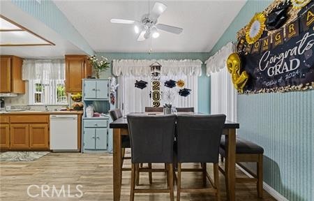 2906 Summer Set Circle Banning, CA 92220 - Photo 6 of 38 a view of a dining room with furniture and chandelier