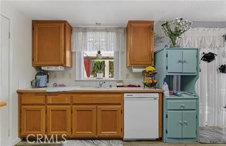 2906 Summer Set Circle Banning, CA 92220 - Photo 8 of 38 a kitchen with cabinets and window