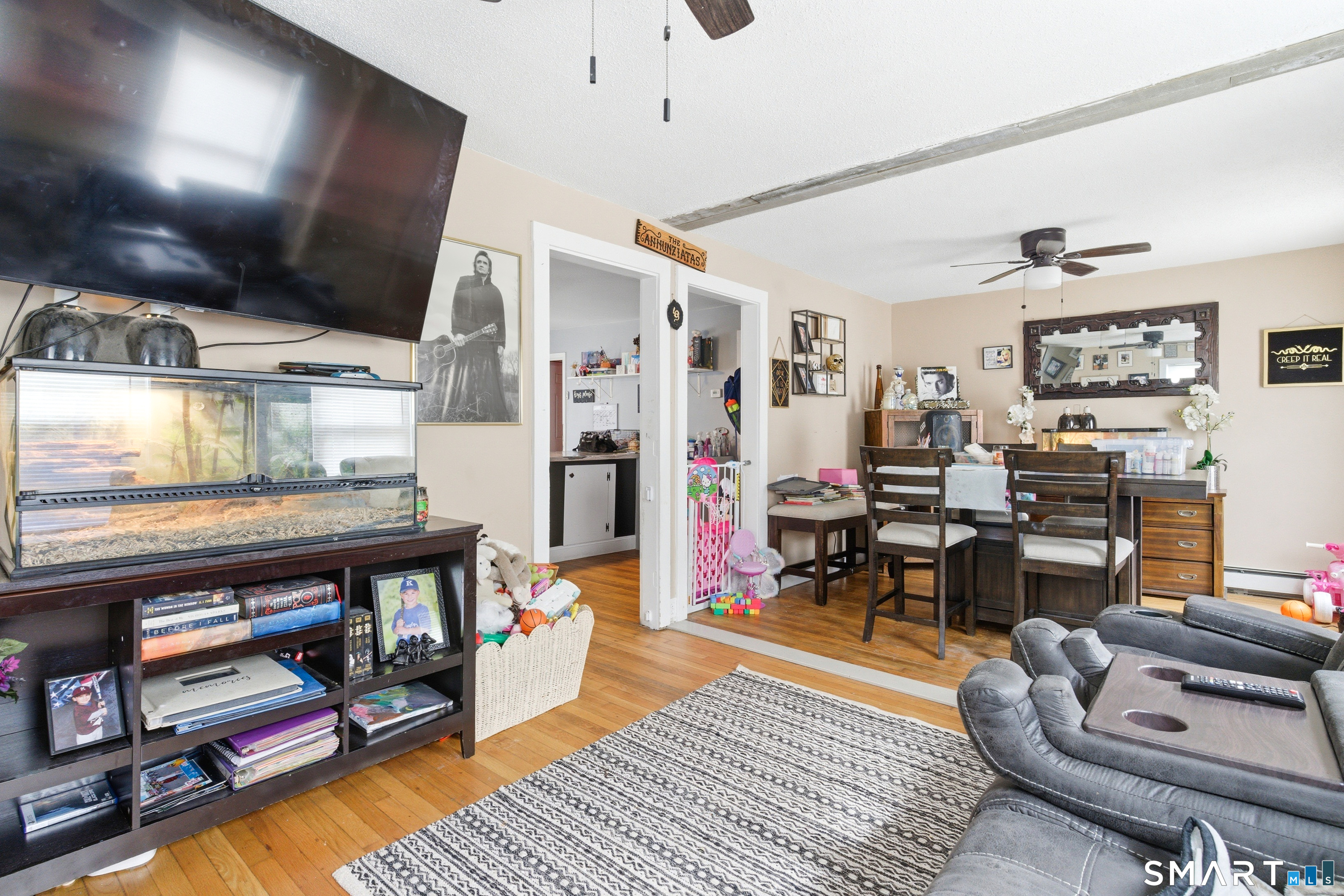 36 Church Street Killingly, CT 06241 - Photo 21 of 39 a living room with furniture and a flat screen tv