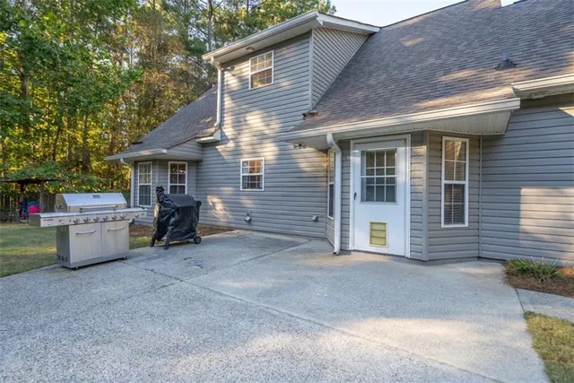 a view of outdoor space with wooden floor