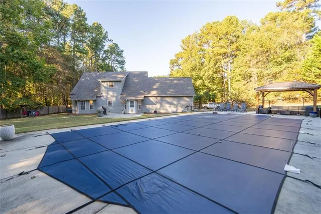 a view of a house with a big yard