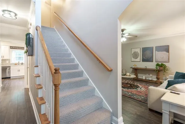 a living room with furniture a fireplace and a table