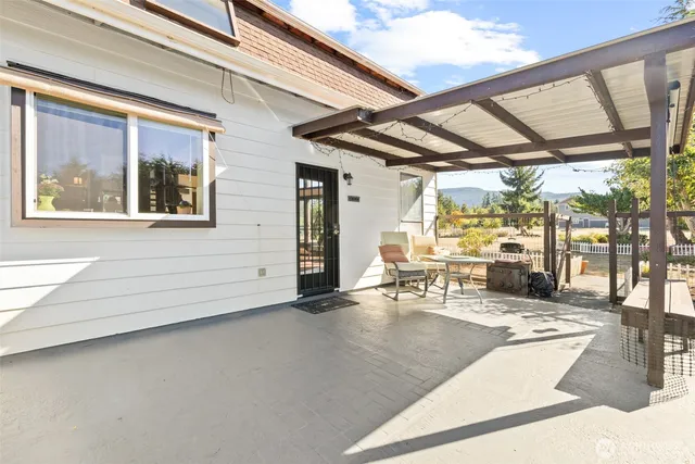 a lobby with furniture and large window